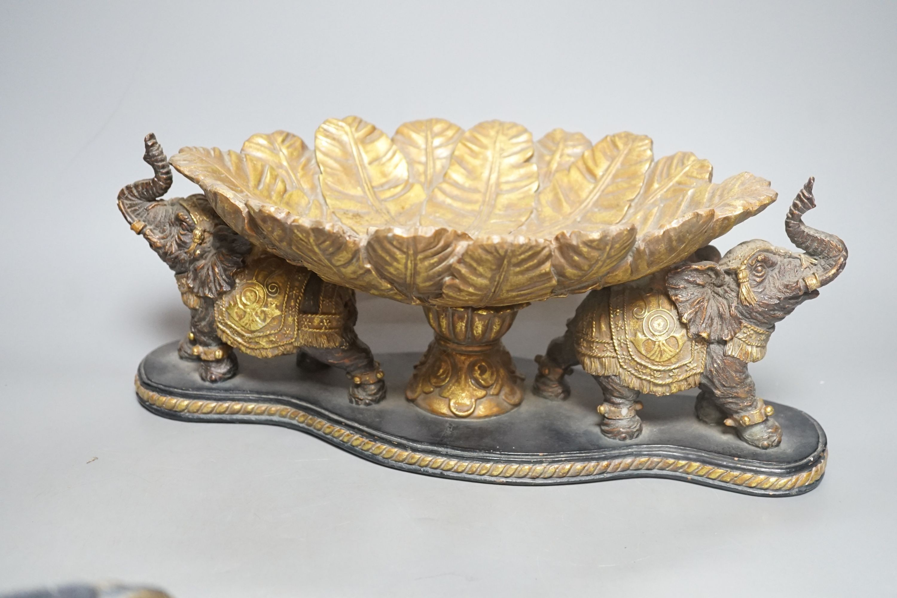 An Indian resin ‘elephant’ box and cover and similar centrepiece, 36cm long